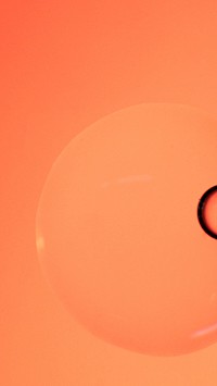 Orange phone wallpaper abstract oil bubble texture background