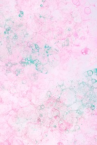 Pink and green bubble art on pink background feminine style