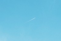 Airplane in a clear blue sky