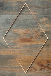 Rhombus gold frame on grunge wooden background vector