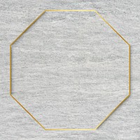 Octagon gold frame on gray cement background vector