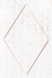 Rhombus rose gold frame on beige marble background vector