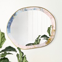 Marble framed mirror on a beige wall