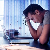 Man feeling sick while working from home during the coronavirus pandemic
