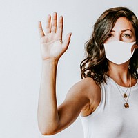 Woman wearing a face mask to prevent coronavirus infection