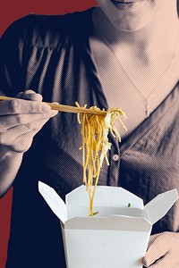 Woman eating a box of Chinese noodles