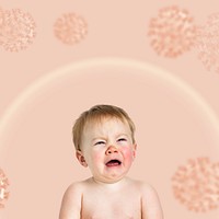 Crying baby on a pink coronavirus contaminated background social ad