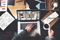 Businessman in a video conference call while working from home during the coronavirus pandemic