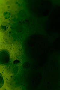 Stain pattern on a dark green background
