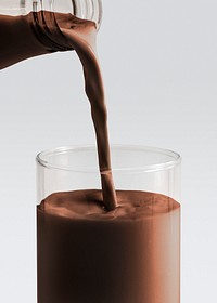 Chocolate milk poured into a glass