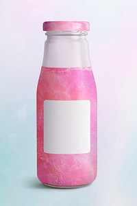 Shimmering pink drink in glass bottle with a label mockup