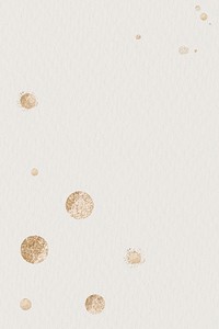 Gold dotted pattern on a beige background