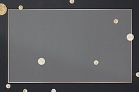Gold frame with shimmery dots on a black background