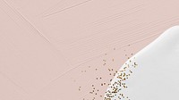 Dull pink brushstroke with gold glitter on white