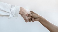 People shaking hands in business agreement
