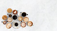 Coffee cups on a white marble textured wallpaper