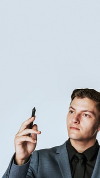 Businessman holding stylus smart technology