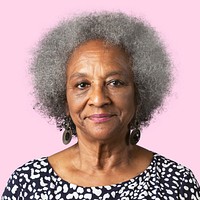 Elderly woman smiling face closeup portrait on pink background