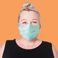 Mature woman wearing mask for Covid-19 prevention campaign