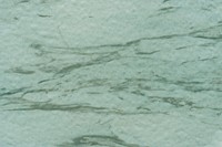 Grungy green marble textured background