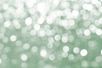 Green defocused glittery background vector