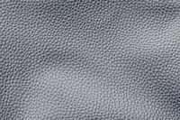 Gray cow leather textured background vector