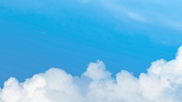 Bright blue sky with clouds background