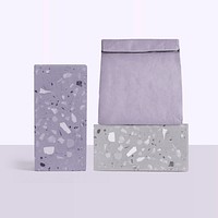 Reusable paper bag rolled up in terrazzo pattern