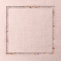 Square frame on pink fabric textured background vector