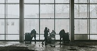 Music band rehearsing in an industrial building