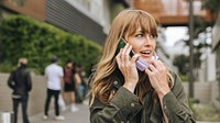 Woman talking on a phone during coronavirus outbreak