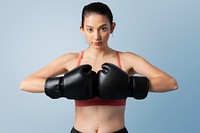 Sportive woman ready to fight on blue background mockup