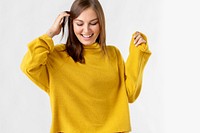 Cheerful woman wearing a mustard yellow sweater