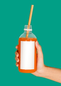 Carrot juice in a bottle with a mockup label