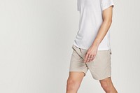 Man in white tee beige shorts mockup