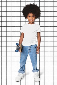 Black boy wearing t-shirt with pants in studio