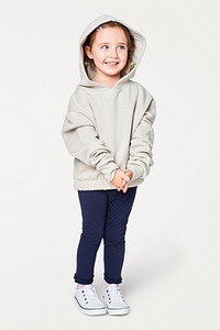 Little cute girl in a beige hoodie