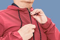 Men&#39;s red hoodie mockup fashion shoot in studio