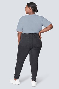 Women&#39;s top and jeans plus size fashion studio shot
