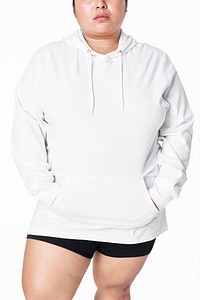 Women&#39;s white hoodie mockup fashion shoot in studio