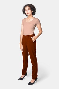 Woman in red slack pants and pink tee full body