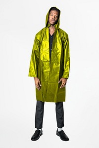 Man in green reflective raincoat men&rsquo;s street fashion full body