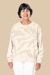 Floral beige winter sweater senior women&rsquo;s apparel shoot