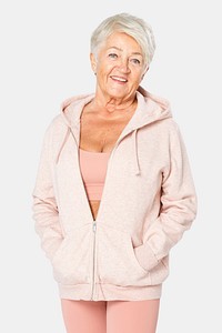 Healthy senior woman in hoodie jacket studio shoot