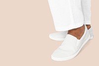 White slip-on shoes casual apparel close up with design space