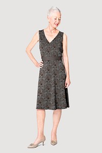 Woman in black midi dress with floral pattern apparel