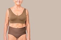 Senior woman in nude bra and underwear with design space