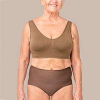 Size inclusive senior woman in brown lingerie studio portrait