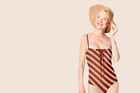 Senior woman in red striped one-piece swimsuit summer apparel with design space