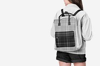 Student with gray flannel backpack with design space